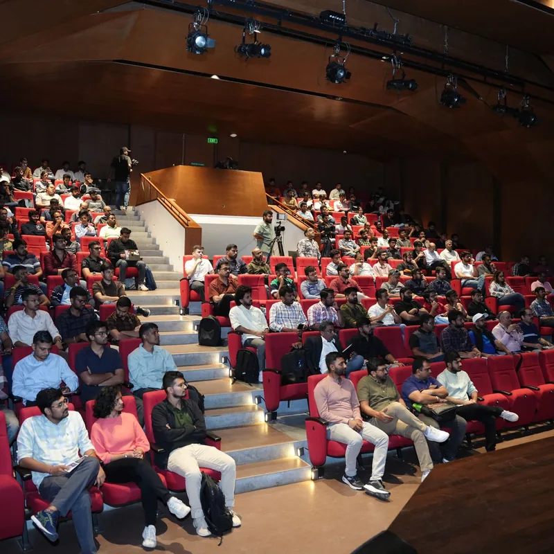 A full auditorium of practitioners at a product launch session in Bengaluru